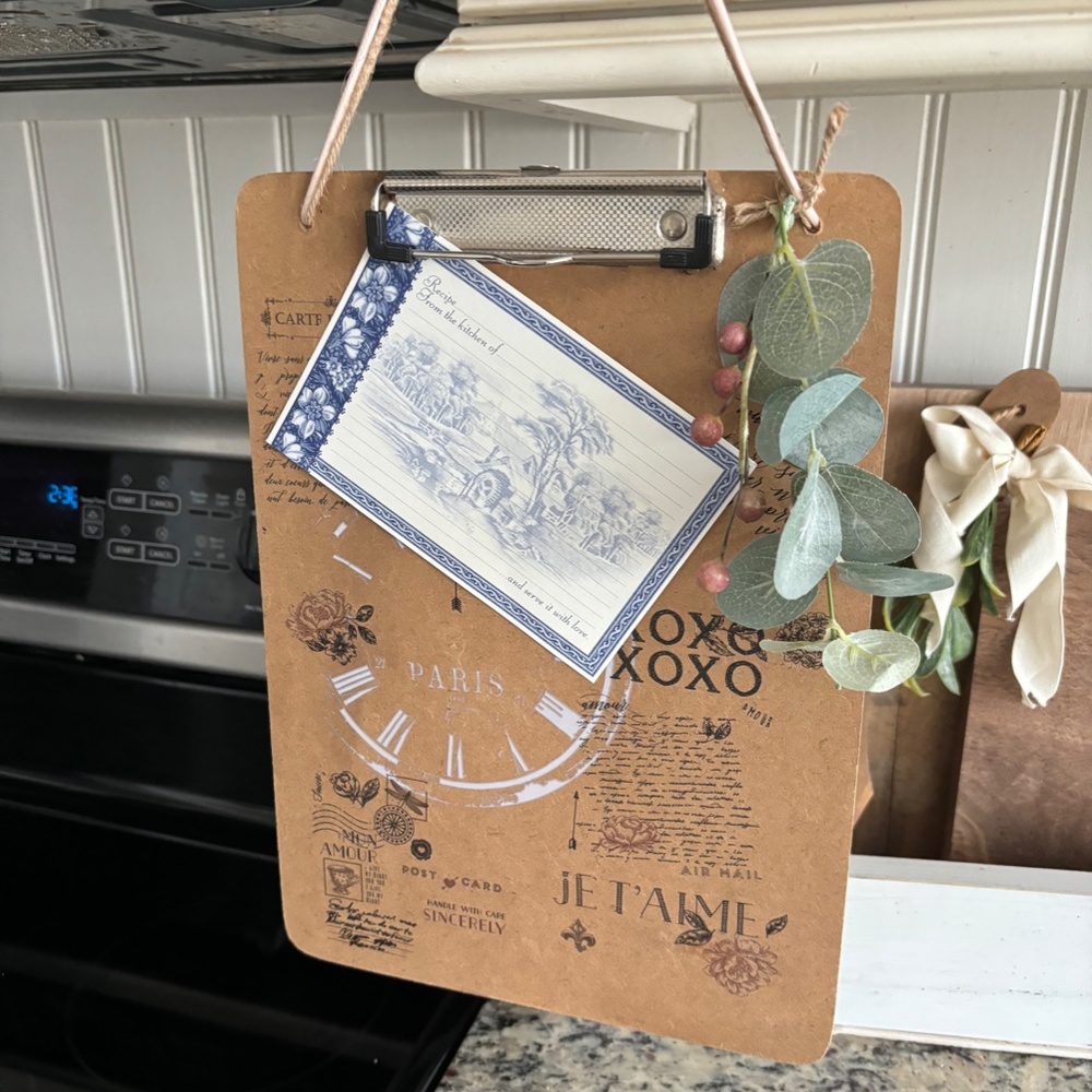 Decorative clipboard with hanger and floral garnish